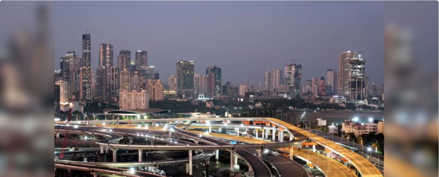 City skyline with illuminated highways